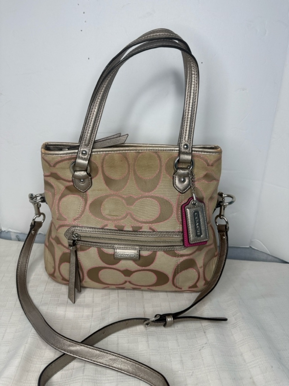 Coach Daisy Outline Signature Metallic Mia Tote handbag, model F23940.